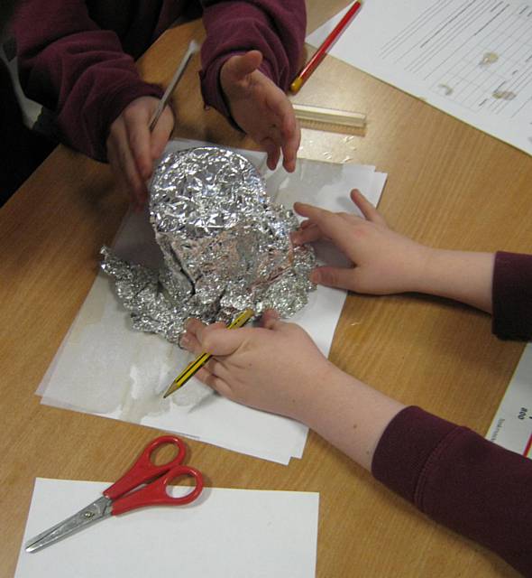 Class 3 cup of tea experiment, using tin foil to insulate was the best