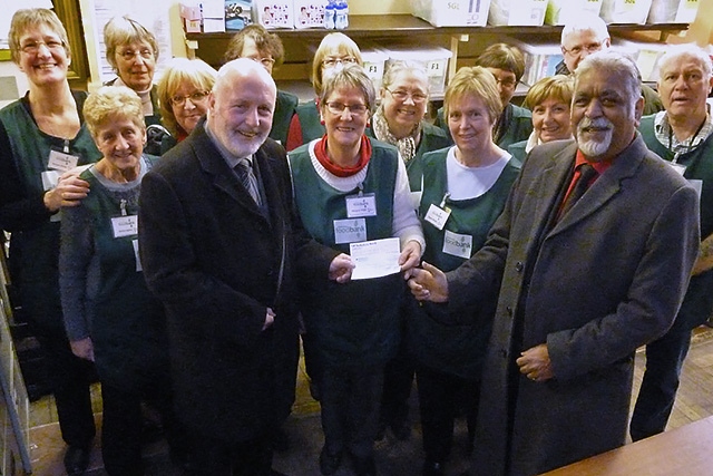 Freemasons Asst Rochdale District Charity Steward Bernard Percy, Foodbank volunteer Margaret Wight and Rochdale District Charity Steward Douglas Smith.