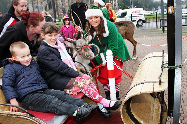 Hayden and Molly Woodward meet a reindeer