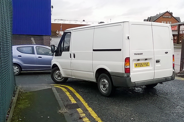 A van turns into a dead end as a car that has already made the same mistake turns back