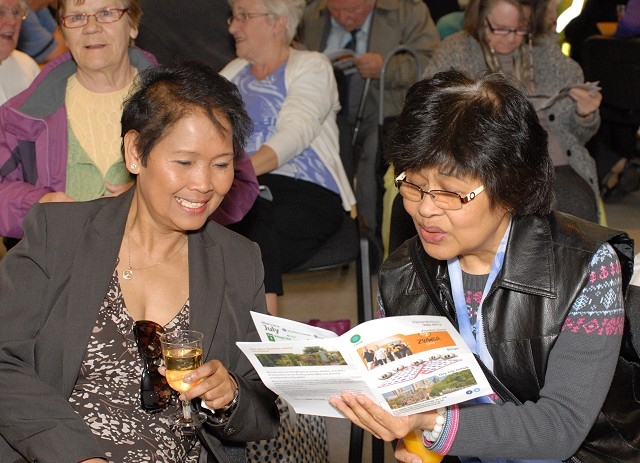 Reading our calendar during the Circle Launch Party at the Pioneer Museum
