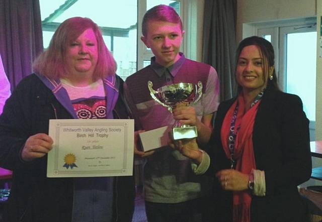 Junior champion Ryan Tetlow is presented with the Birch Hill Trophy by Councillor Hilary Rodgers and Councillor Shefali Ahmed