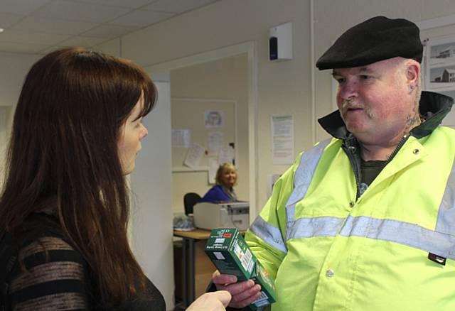 RBH Sustainability Co-ordinator, Ros Martin, gives advice to a local resident at the energy awareness event