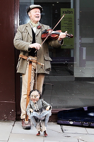 Michael Wray busking in Rochdale Town Centre