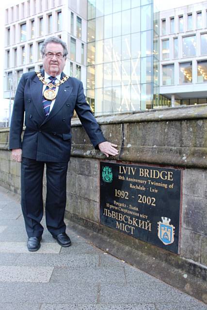 The Mayor on Lviv Bridge in the Centre of Rochdale in front of council headquarters Number One Riverside. The plaque was installed in 2002 and celebrates the 10th Anniversary of the twinning of both towns