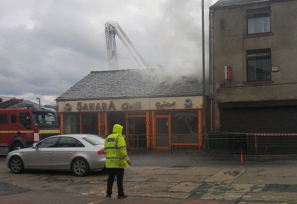 Firefighters tackle the blaze at Sahara Grill