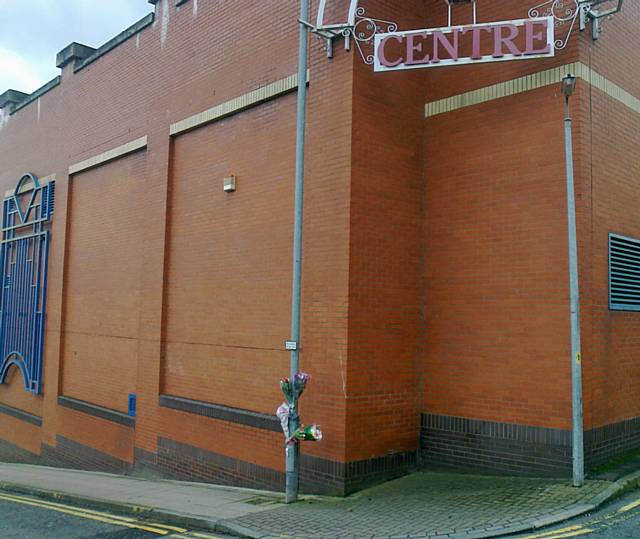 Flowers left on Penn Street at the rear of the Wheatsheaf Centre following the death of Tracey Shelvey