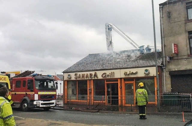 Firefighters tackle the blaze at Sahara Grill