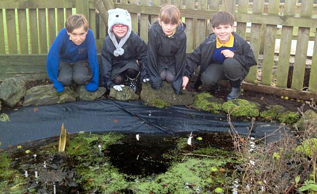 St Edward's School pupils at the pond 