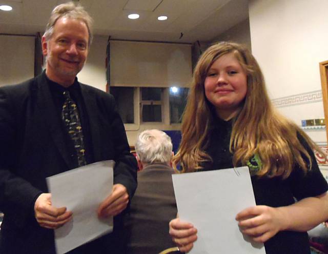 Adjudicator Kevin Rivett with a member of  Wardle Academy’s Folk Group  