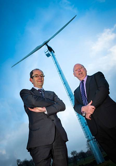 Rochdale Borough Council's leader Councillor Colin Lambert with Councillor Peter Williams, Cabinet Member for Economic Development and Customer Services, at the site of the pilot turbine
