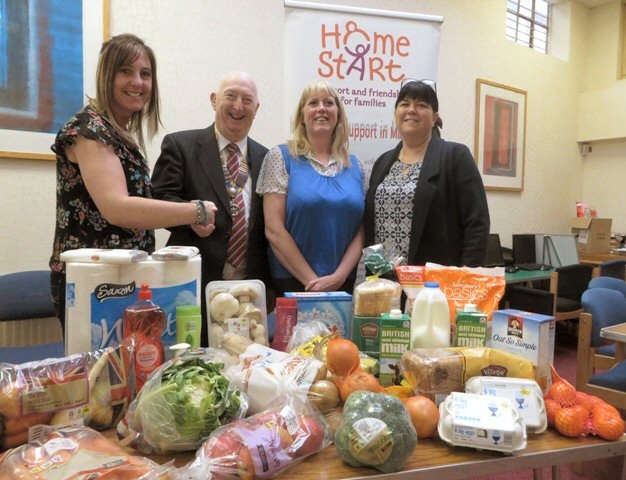 Donna Arden (Home-Start Scheme Manager), Rotary President Stuart Sawle, Ali Kirkpatrick (Home-Start Family Support Worker), Sharon Pearson (Home-Start Office Manager)