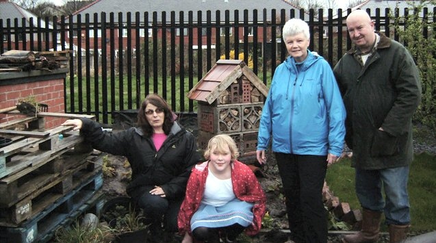 ​Croft Committee members Laura Illingworth, Maureen Glynn, Jim Rose and Charlotte Dixon in front of the 'Bug House'