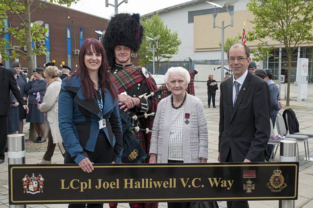 Deputy Chief Executive Linda Fisher; Armed Forces Officer Stuart Hay; Dora Joel Halliwell's daughter and council leader Colin Lambert unveil the new street sign