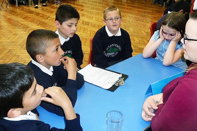 Pupils at Meanwood Careers Fair speaking to Rochdale Online Journalist, Amy Westlake