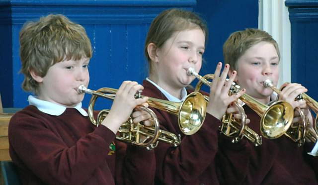 Year 6 pupils from Stansfield Hall Primary School playing the cornet