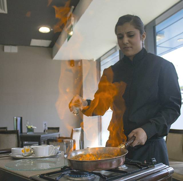 Zarka Hussain showing off her flambé skills