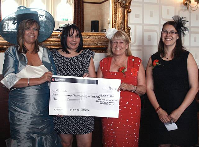 Nicki McGill and Paula Farthing present a cheque to Merrilyn Chadwick, NSPCC Branch President and Debra Sefton, NSPCC Community Fundraising Manager