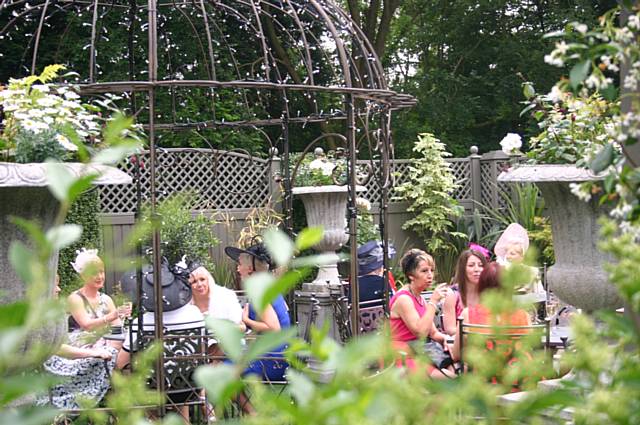 Ladies enjoying bubbly in the newly opened Secret Garden 