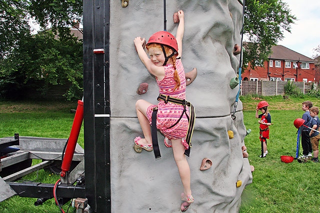 Faith Mulholland on the climbing wall