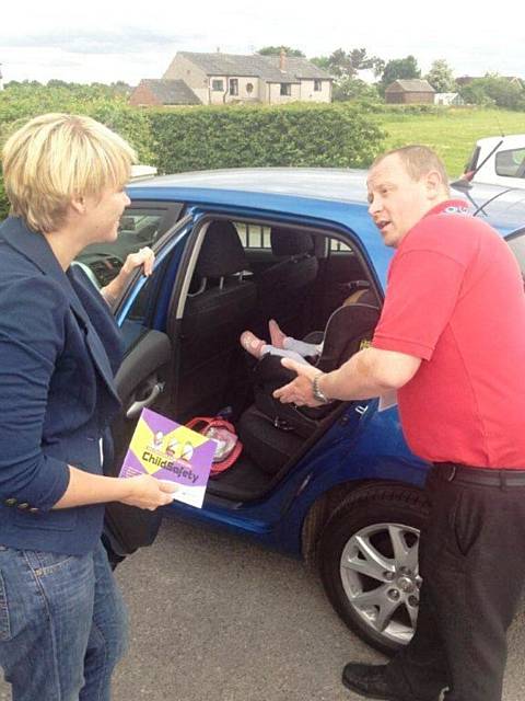 Road Safety advisor Dave Godley shows how to properly secure car seats at the Buttercups Nursery in Heywood