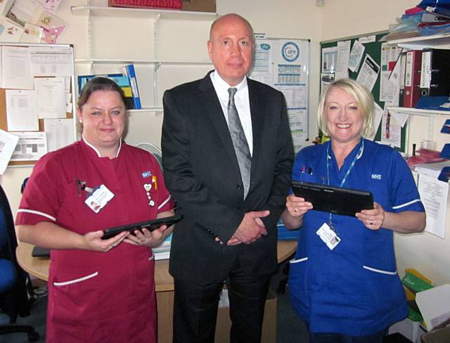 Chief Executive Michael McCourt with Shelley Harrison (left) and Sam Kerr (right) from Woodside A district nursing team in Middleton