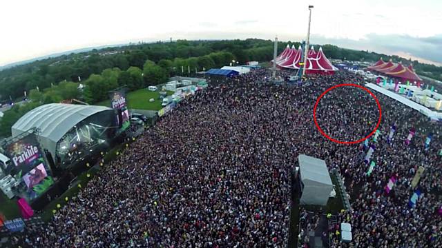 Image of the crowd at the main stage with an identified area of where the assault took place