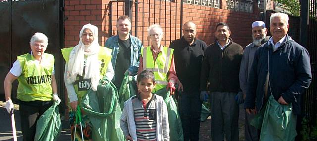 Residents of the King Street South and members of the REAG clean the back alleys