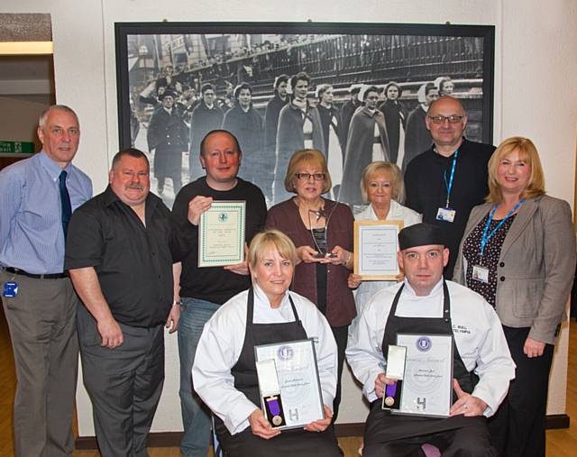 Members of the Trust’s catering departments from around the hospital sites are pictured with their certificate and trophy