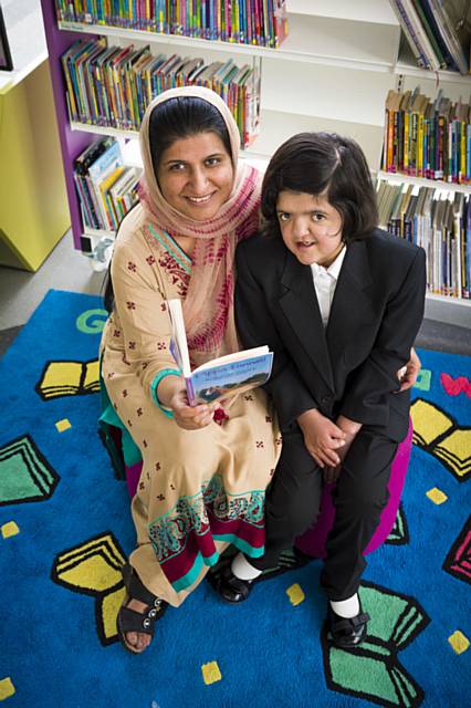 Carer Zahida Iqbal with her daughter