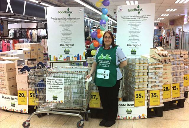 Amanda Hardy, from Tesco with the display for Rochdale Foodbank