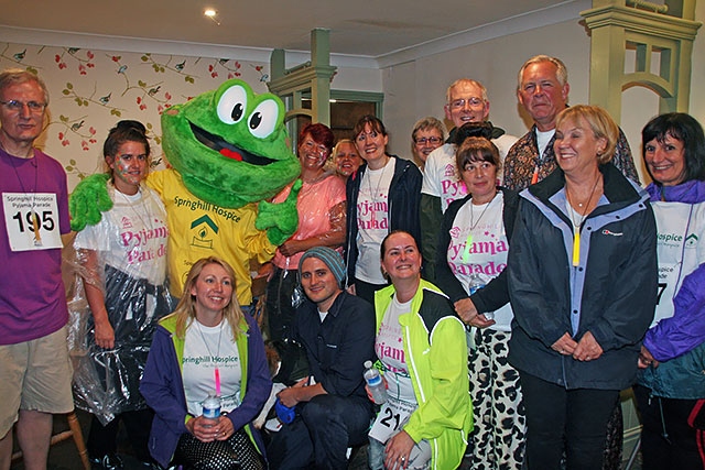 Springy the Hospice Frog with members of the Rochdale Law Association ready for the Pyjama Parade