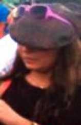 Witness picture seven: Female, brown hair, flat cap, black top, pink framed sunglasses. 
