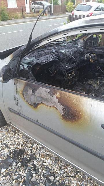 Car torched in Milnrow
