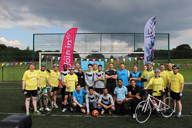 Celebrities taking part in the Tour de ITV (yellow t-shirts) at Hopwood Hall College with the Deaf Rhinos football team (in grey tops), Sports Arena College staff (in blue tops and bibs) with (in black tops) Dewan Choudhury, Football Development Officer (back row left), Tom Conroy, Football Development Officer (back row right) and Paul Driver, Sports Arena Manager (kneeling