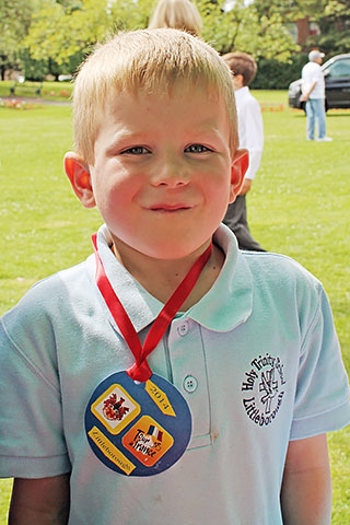 Colin with his multi-faith pendant