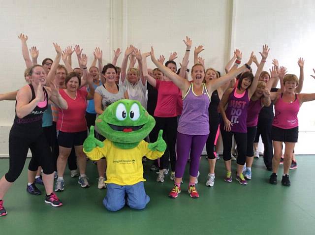 Zumbathon participants with Springy the Hospice frog