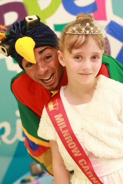 Carnival Princess Tia Foster is pictured with Frederico Flapalot