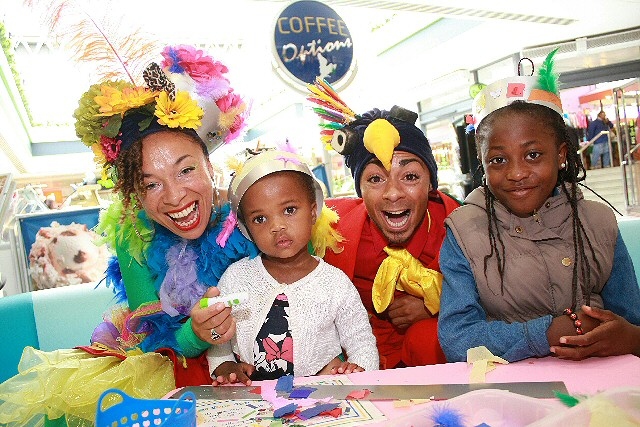 Miranda Maracas and Frederico Flapalot with Melissa, nine, and Aissa, two, Miranda