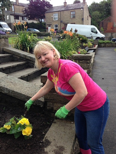 Lesley Stott planting at the gardening event