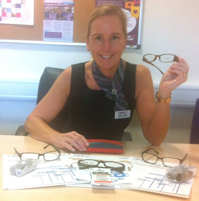 Melanie Mills with examples of the eye-care goods sent to Vision Aid Overseas