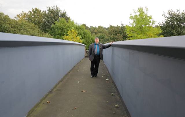 Councillor John Hartley at Greenvale Mill bridge after the clean up