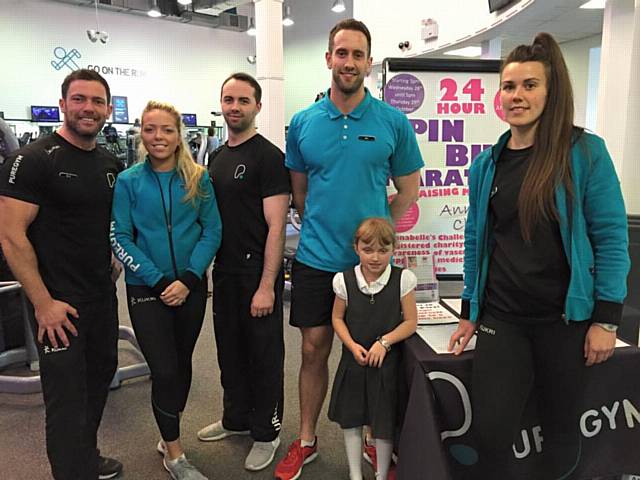 Customers and staff at Pure Gym Rochdale with six-year-old Annabelle Griffin