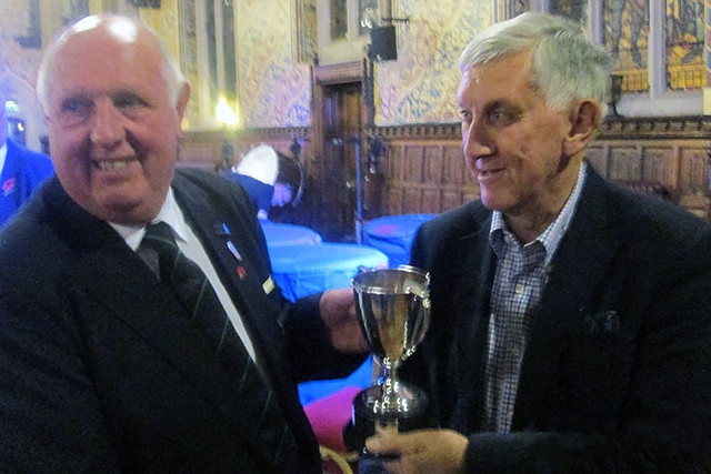 Rochdale Festival of Brass<br /> NWABBA President Malcolm Brownbill presenting the third place trophy to Vernon Building Society (Poynton) Band