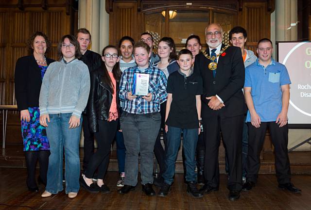 The young people from Rochdale Borough Disability Forum celebrate their win with Mayor of Rochdale, Surinder Biant and Gail Hopper, director of children's services