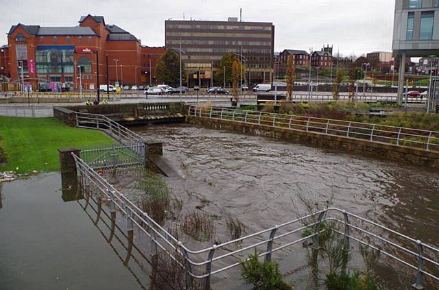 A swollen River Roch in Rochdale town centre