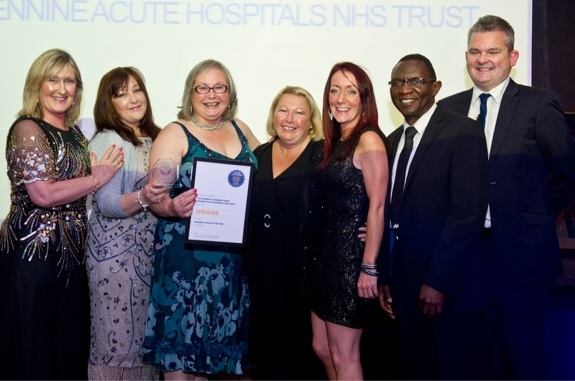 The research team from Fairfield General Hospital with Debbie Vinsun, chief operating officer at NIHR Clinical Research Network Greater Manchester, Paula Mulligan, Linda Kent, Denise McSorland, Joanne Taylor, Joe Ogor and with Simon Denegri, national director for public participation and engagement in research at the National Institute for Health Research (NIHR)