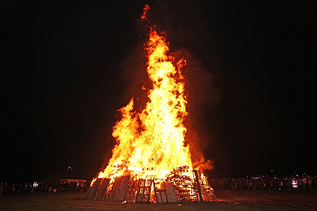 Thousands attend organised displays but firefighters attacked by ‘mindless minority