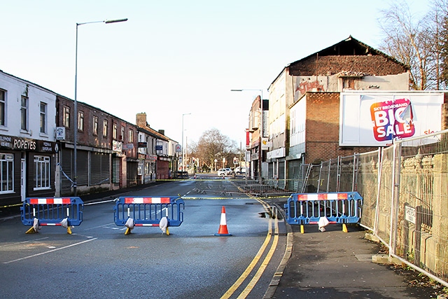 A wall of the former Baby World store in Middleton has partly collapsed due to damage from the wind