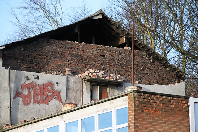 A wall of the former Baby World store in Middleton has partly collapsed due to damage from the wind